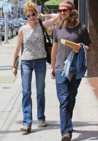 Alexander Bauer with his mother, Melanie Griffith.